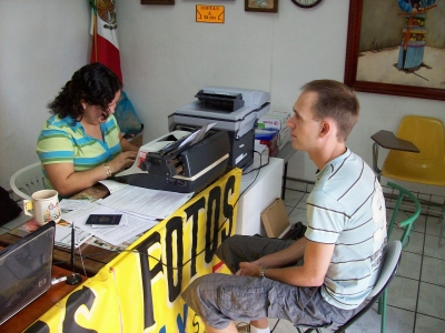 filling out paperwork for applying for FM3 visas (outside Palacio Federal building) in downtown Guadalajara, Jalisco, Mexico