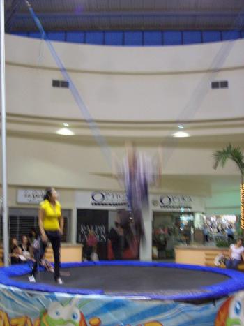 Andrew J. Wharton plays on bungee at Bugambilias Mall in Zapopan, Jalisco, Mexico, near Guadalajara